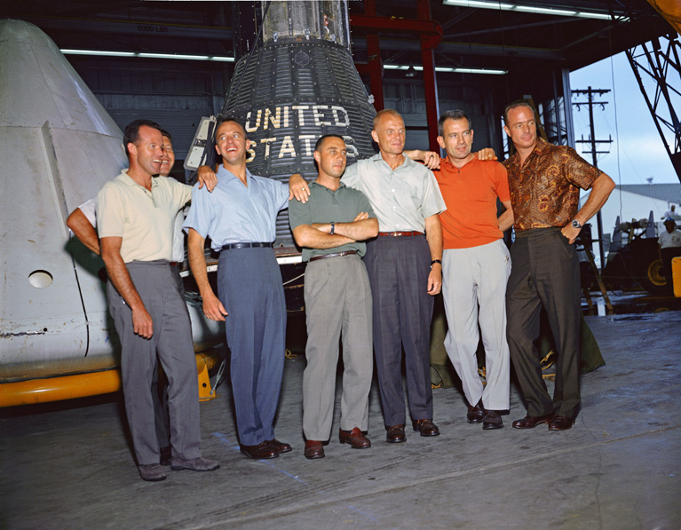 The Mercury Seven with the capsule