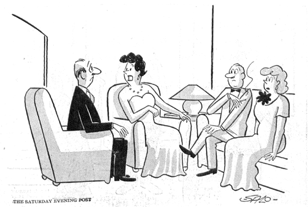 Two couples having a conversation in a living room