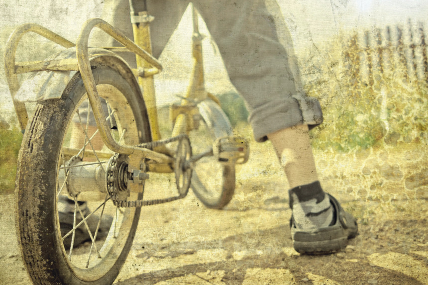 kid riding bicycle