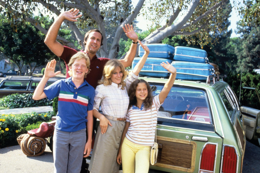 The cast of "National Lampoon's Vacation waving in front of their station wagon.