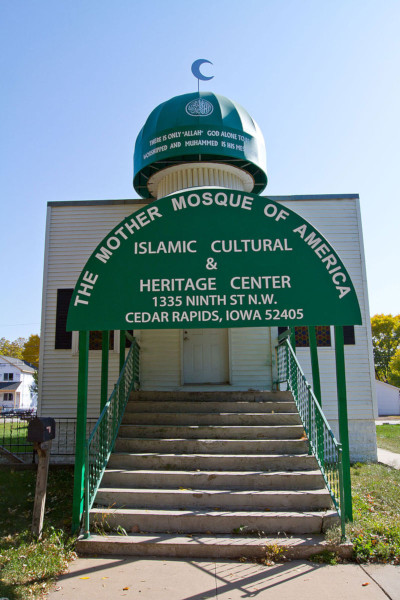 The front steps of the Mother Mosque of America, with an awning containing the building's name.