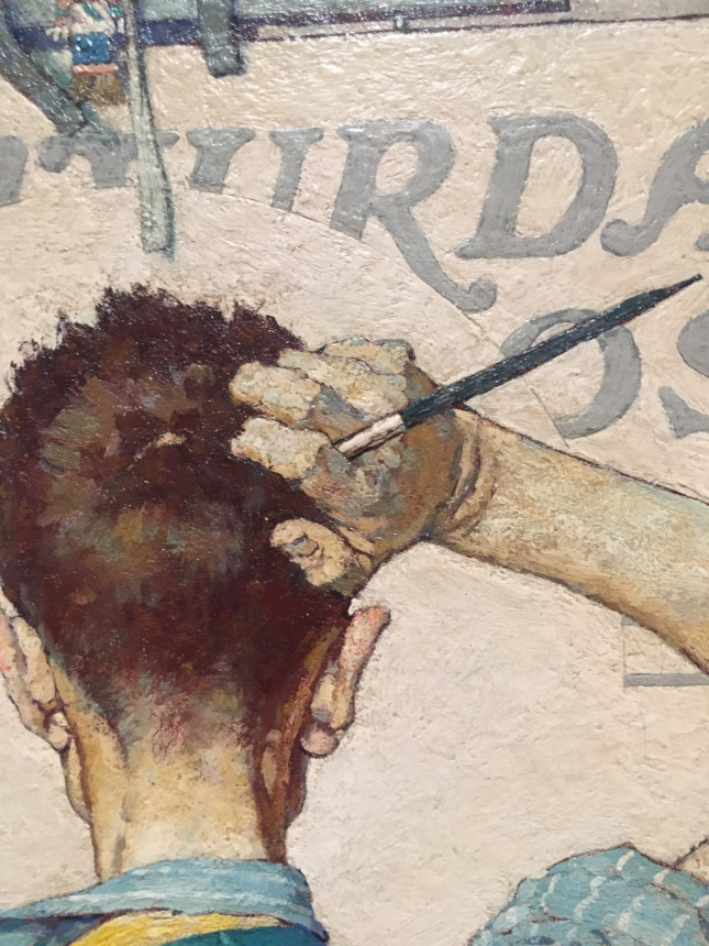 In this painting, Norman Rockwell is scratching the back of his head as he suffers from artist block. The detail of the hand, which is also holding a paintbrush, can be seen.