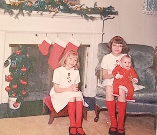 A Gay Haubner with her two sisters during Christmas. 