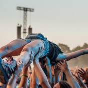Woman crowdsurfing during a rock concert