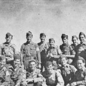 World War II soldier Paul Swank and his unit pose for a photo