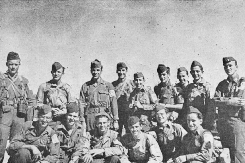 World War II soldier Paul Swank and his unit pose for a photo