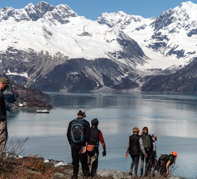 People hiking through Glacier Bay