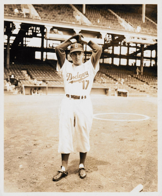 Photo of Brooklyn Dodgers pitcher Carl Erskine, during one of his wind-ups.