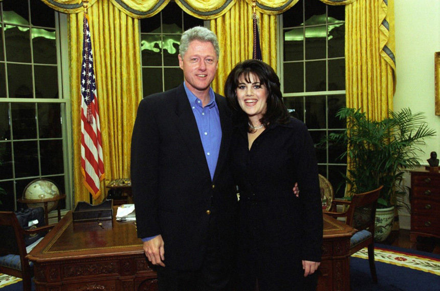 U.S. President Bill Clinton posing with White House intern Monica Lewinsky in the Oval Office