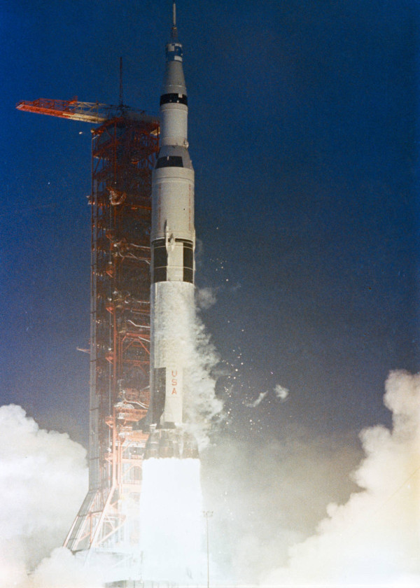 The Apollo 12 rocket in mid-launch