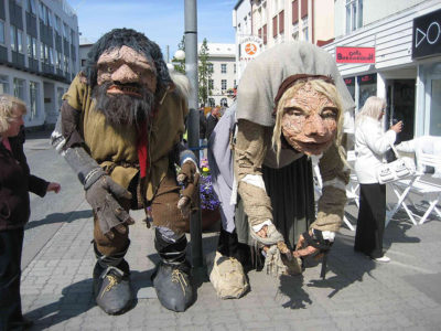 People in costumes of Icelandic Christmas figures, Gryla and Leppaluoi.