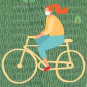 Woman riding a bike while wearing a surgical mask.