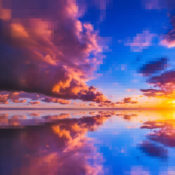 A sunrise over a body of water. Parts of the image are pixelated.