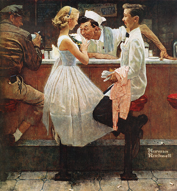 A soda jerk smells a teenager's corsage as she and her date get a drink of cola at the drugstore, following their high school prom.