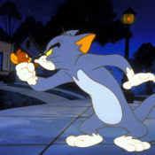 Tom the cat holding Jerry the mouse