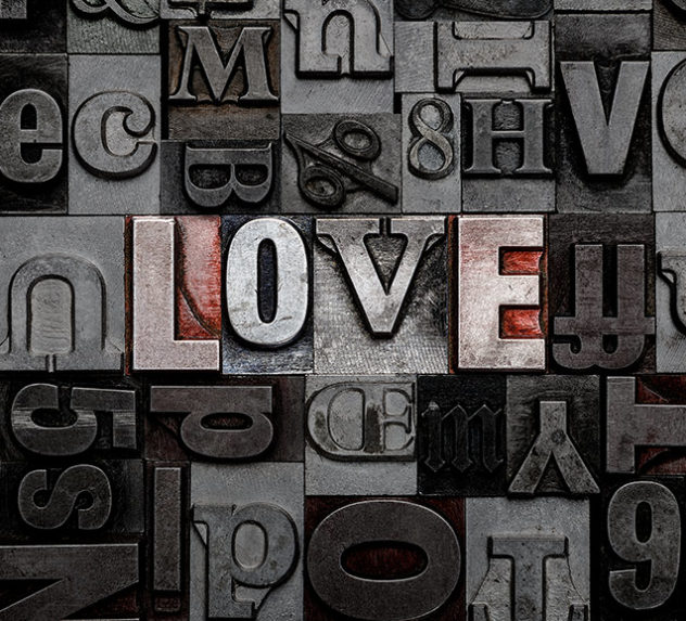 The word love in typewriter font