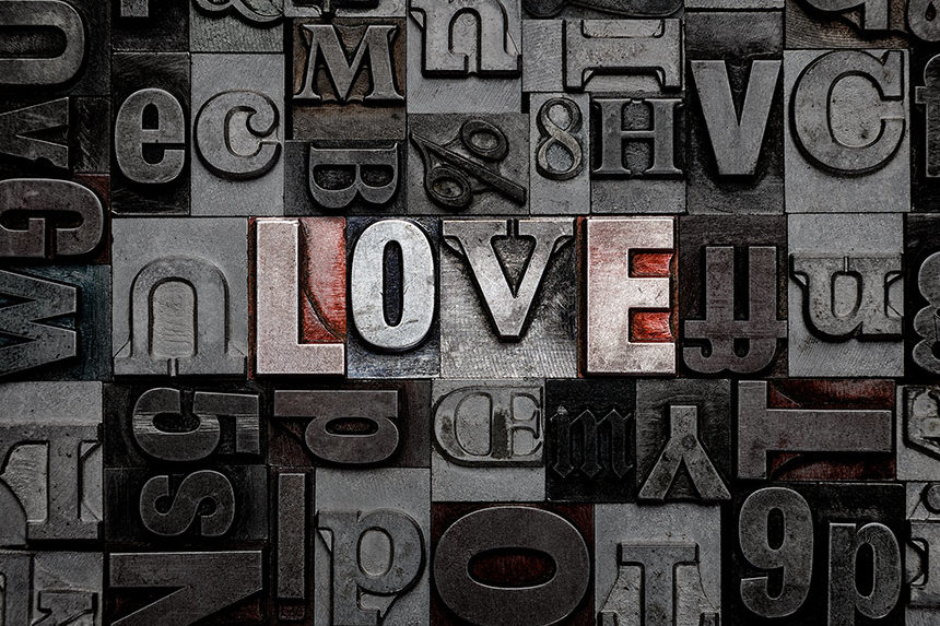 The word love in typewriter font