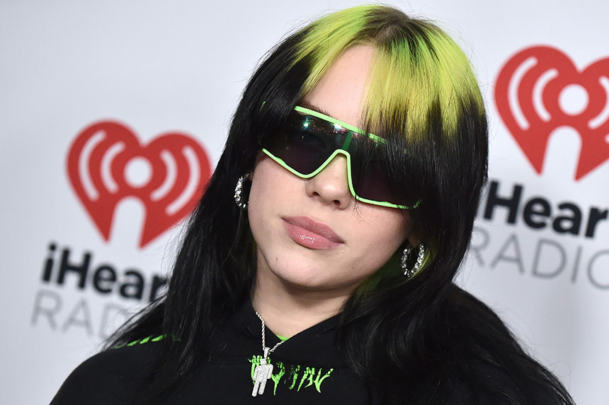 Singer Billie Eilish wears dark sunglasses at an event in Los Angeles