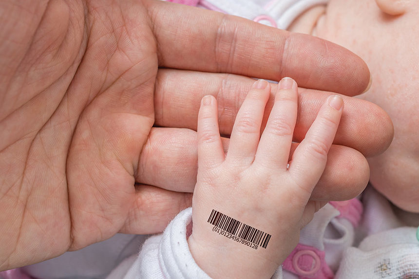 Baby hand with a barcode on it.