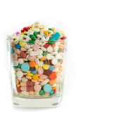 A glass full of pills