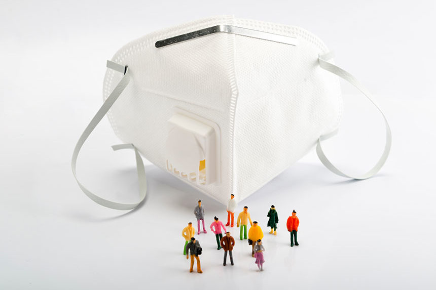 Surgical mask surrounded by little figures