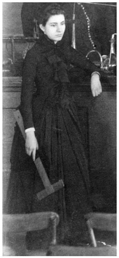 Sophia Hayden holding a T-square ruler