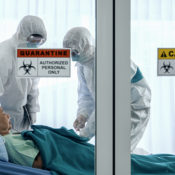 Doctors treating a coronavirus patient in an ICU