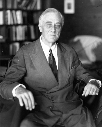 The last photo taken of Franklin Delano Roosevelt. He looks wan as he sits in a chair.