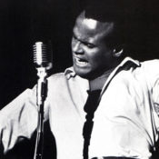 Harry Belifonte performing on stage