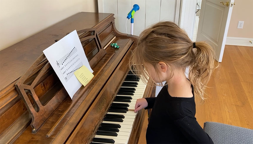 Tim Durham's daughter playing a piano