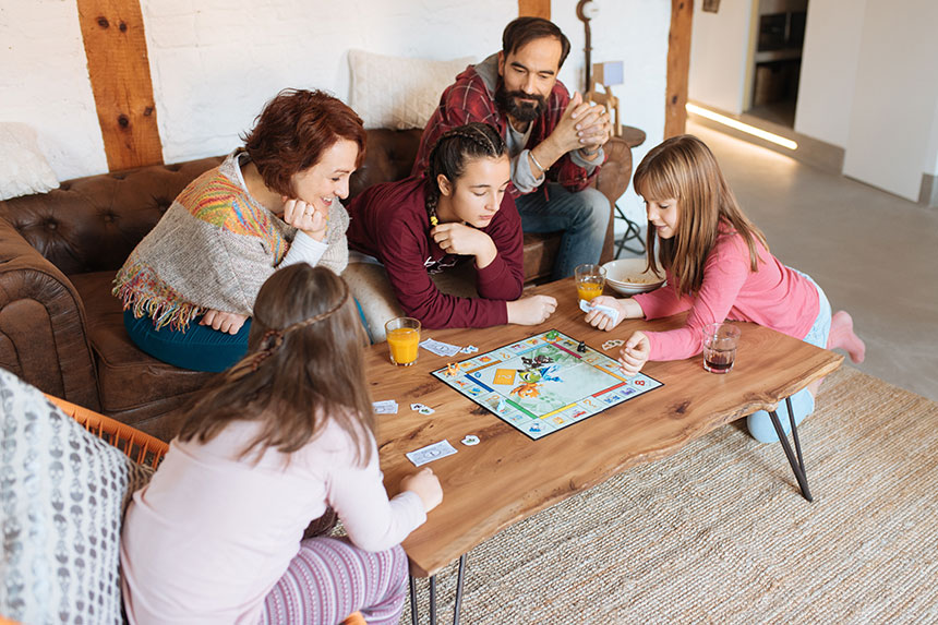 Family playing a boardgame