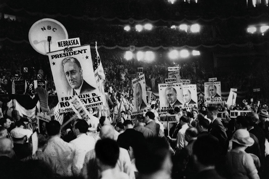 People cheering at a rally for FDR