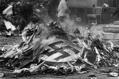 A Nazi swastika burns