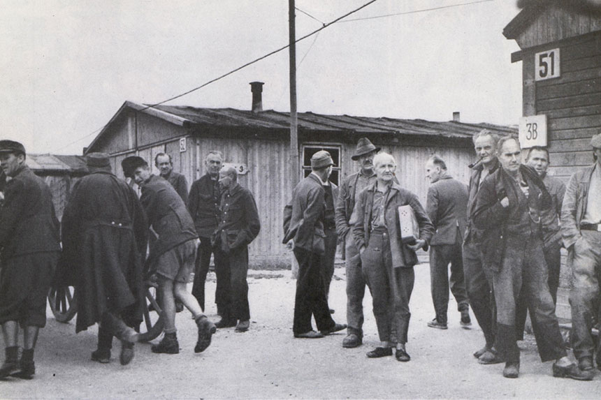 Germans stand inside the Moosberg Internment Camp