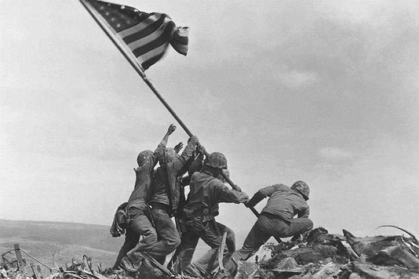 U.S. Marines raising the American flag after the Battle of Iwo Jima during World War II