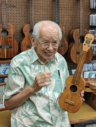 Ukulele player Fred Kamaka Sr. shows off his collection of instruments.