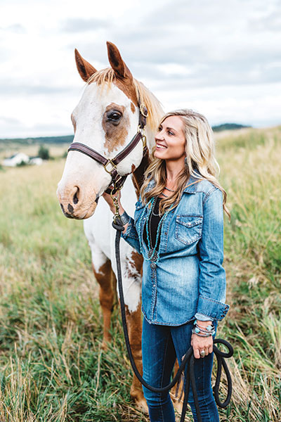 Devon Combs with her therapy horse, Jack.
