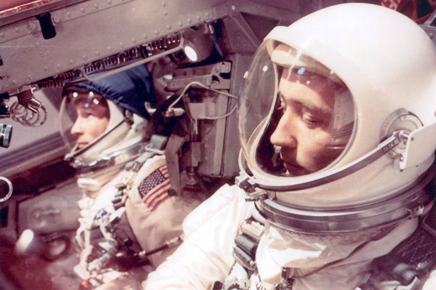 Ed White and James McDivitt in their space suits inside Gemini IV