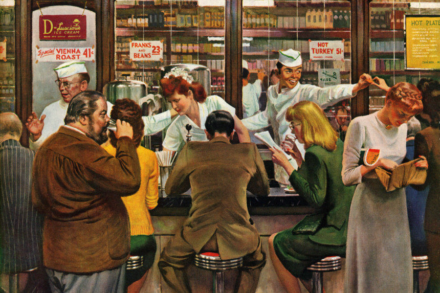 People ordering food and eating at a lunch counter.