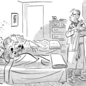 Frustrated father with crying baby listens to a complaint.