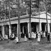 Members of the Chautauqua community gather outside the Hall of Philosophy