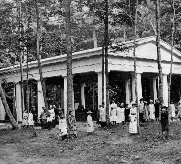 Members of the Chautauqua community gather outside the Hall of Philosophy