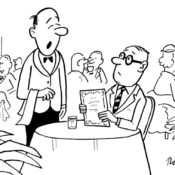 Waiter speaks with a patron