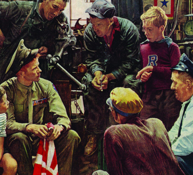 Solder who have come home from the war speaks to friends and family in his garage