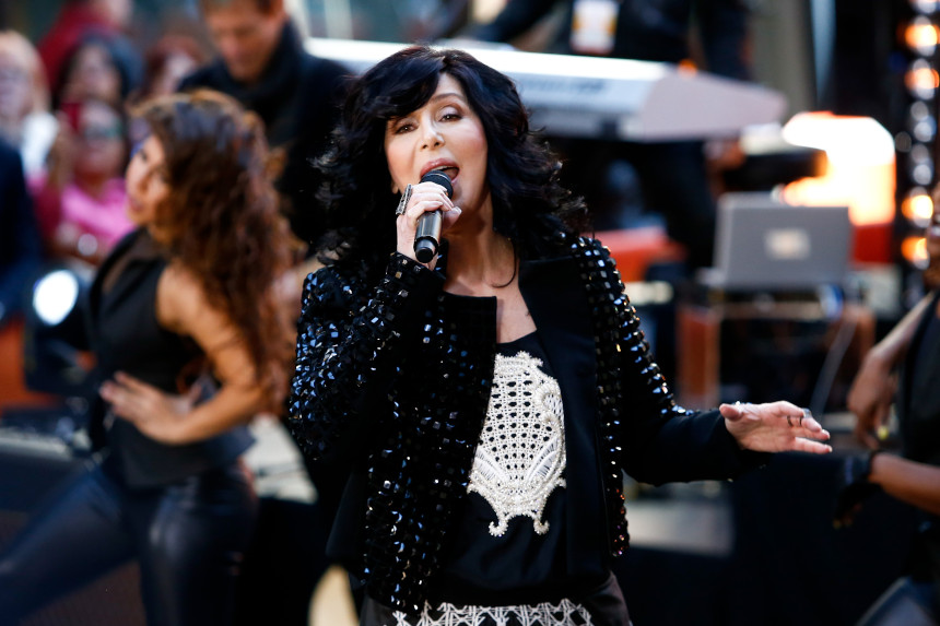 Cher singing in front of an audience