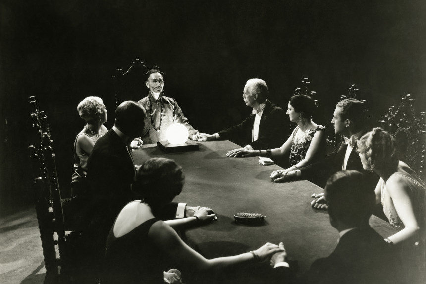 1920s photo of people attempting to communicate with spirits