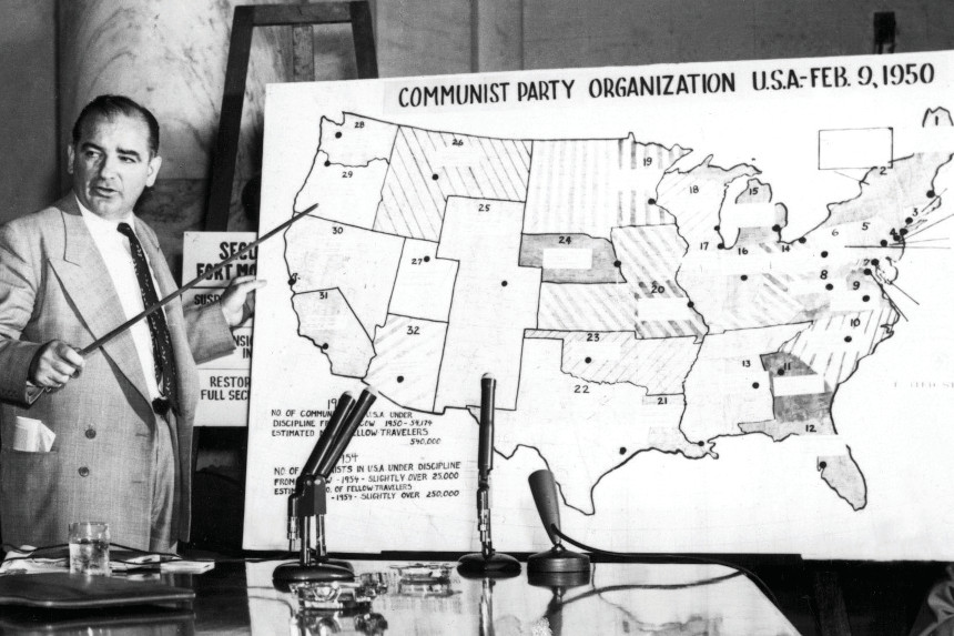 Joseph McCarthy points to a U.S. map during the Army-McCarthy hearings