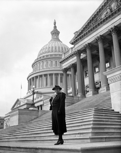Hattie Wyatt Caraway in front of the U.S. Capitol building