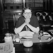 Hattie Wyatt Caraway behind her senate office's desk