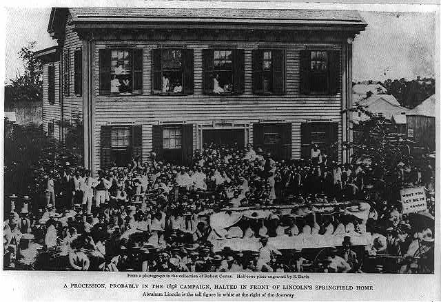 Abraham Lincoln meets supporters at a rally outside his home in Springfield, Illinois